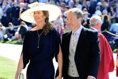 Tom Bradby, seen arriving at Meghan and Harry's wedding with his wife, Claudia, in May 2018, interviewed the couple during their 2019 tour of Africa. (Ian West/Pool via Reuters)