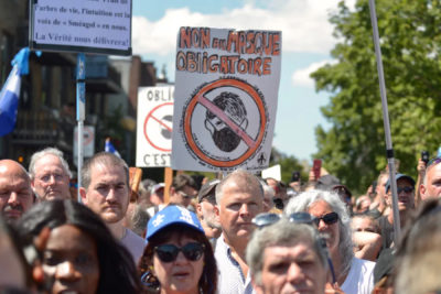 کبک : راهپیمایی هزاران نفر در اعتراض به اجباری شدن ماسک در مونترال